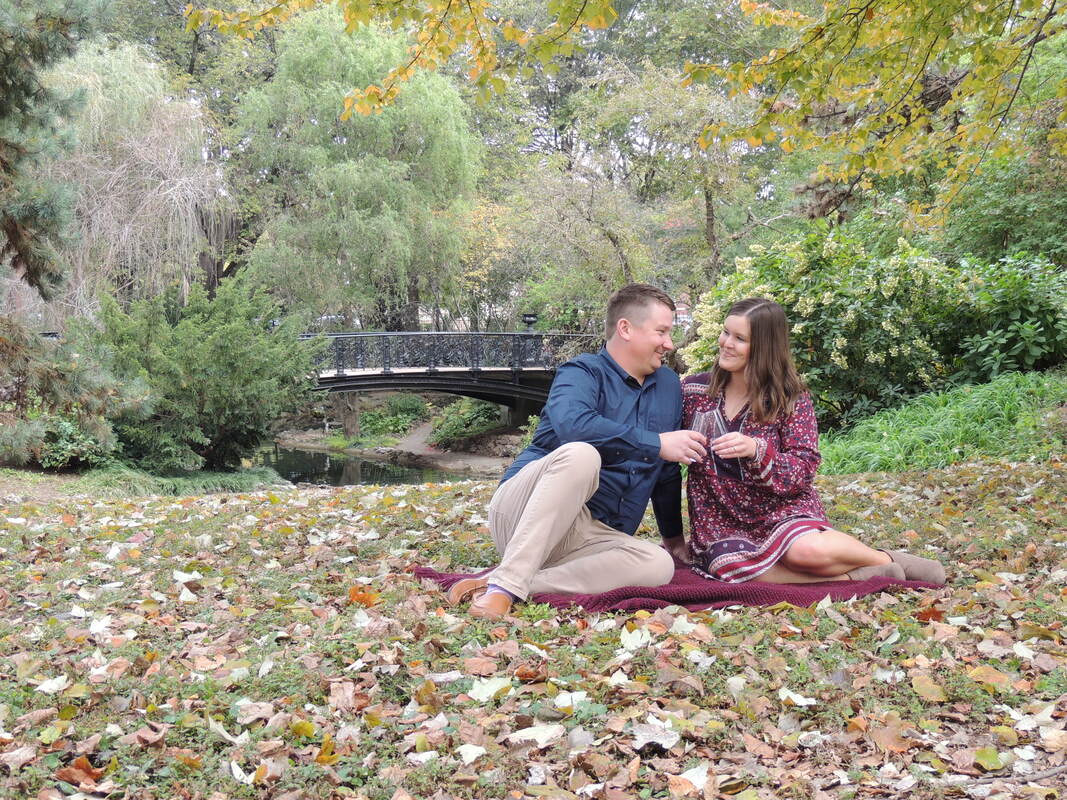 Couple posing in a park