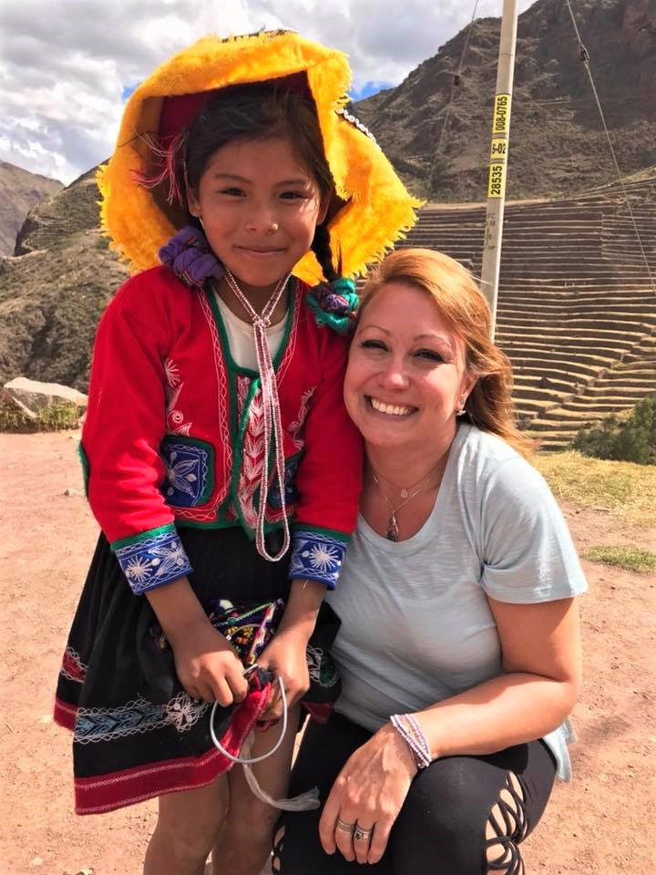 Rachel with a Peruvian child in Peru.