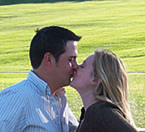 Couple Kissing in Field 