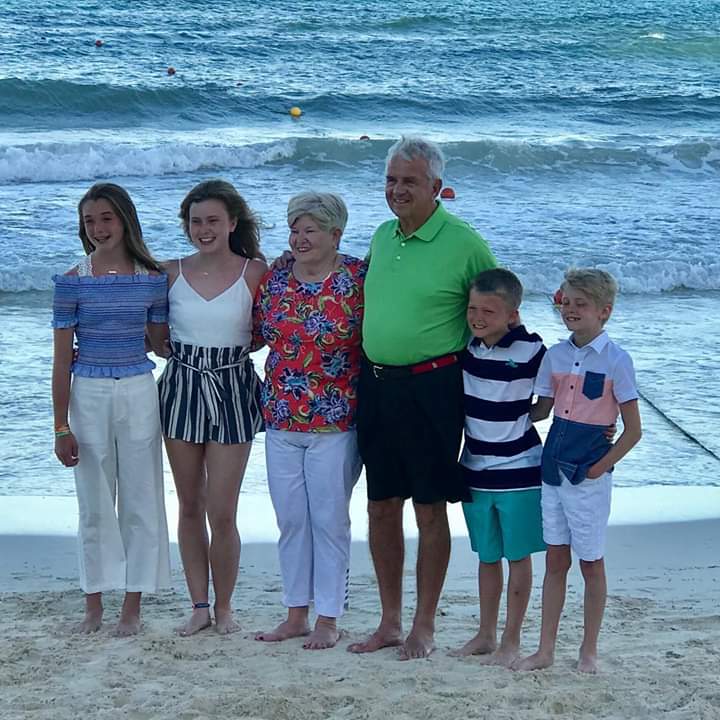 Mickey, her husband and their grandchildren while in Mexico.