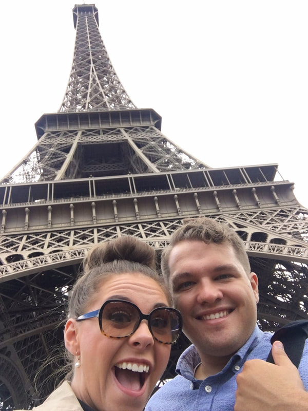 Missi with husband Brian with the Eiffel Tower in Paris