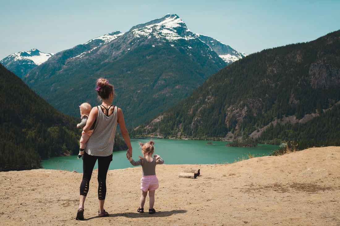 Mother and children exploring the mountains