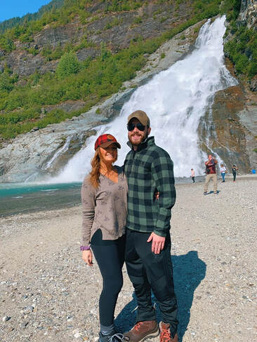 Christine and her fiance at Mendenhall Glacier Lake during their stop in Juneau, Alaska.