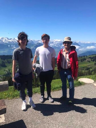 Stephanie's two grandsons with their guide in Switzerland.