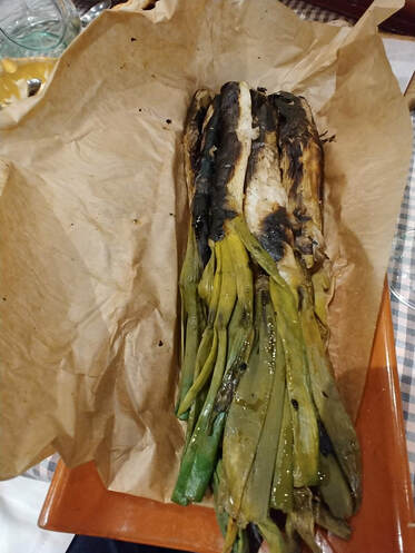 delicacy of onions that had been grilled to a burnt black
